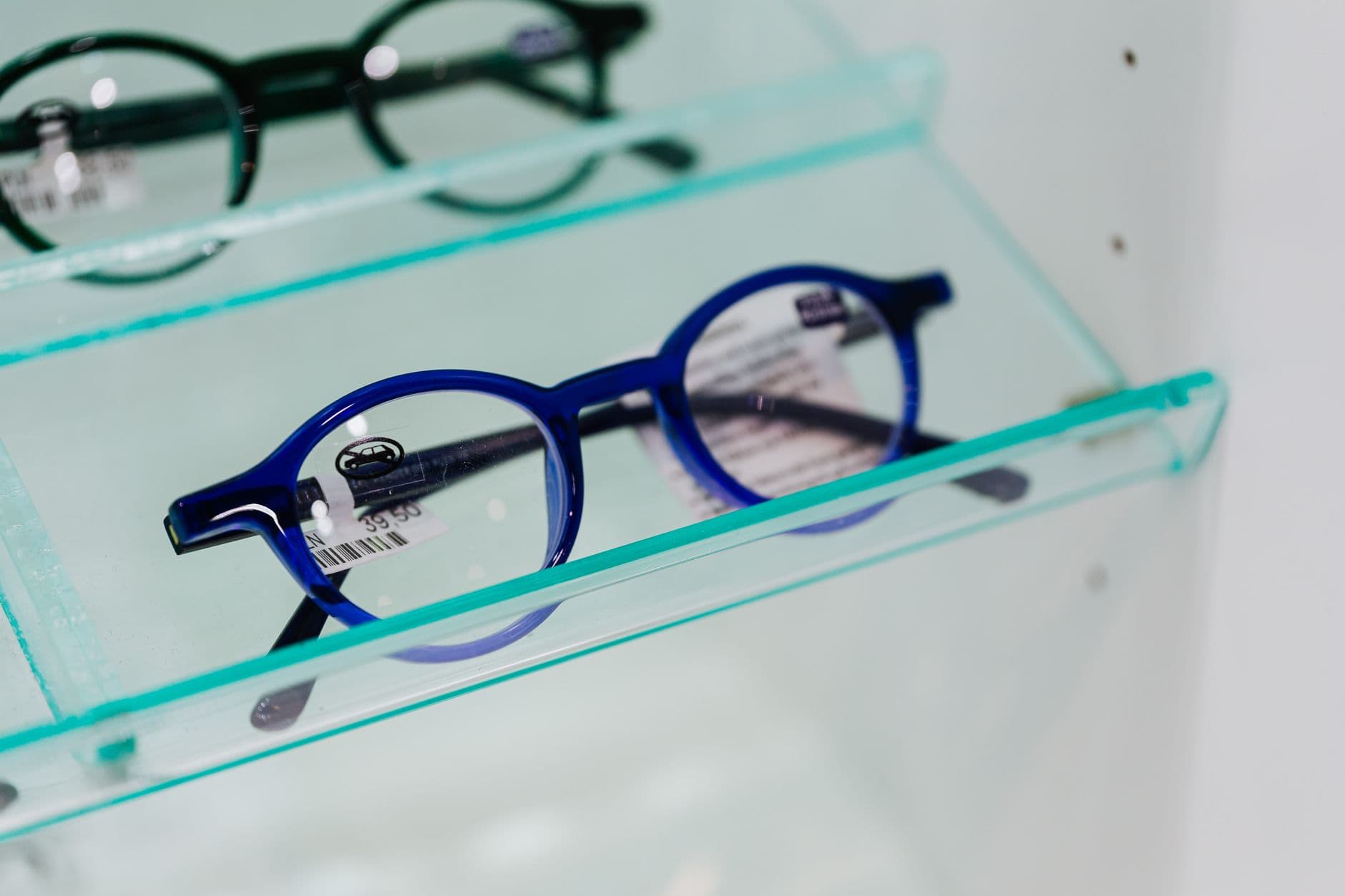 A glasses frame on a shelf