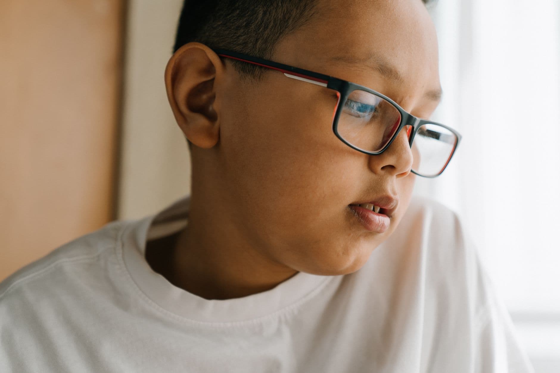 A child wearing glasses